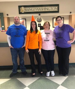 Bank employees dressed up as crayons